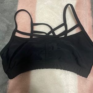 Onzie brand strapy sports bra, size s/m runs small